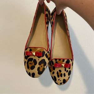 Leopard print Kate Spade flats with red and gold bow